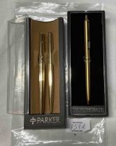 A 1981 display cased Parker cartridge fountain pen and matching roller ball pen with gold plated