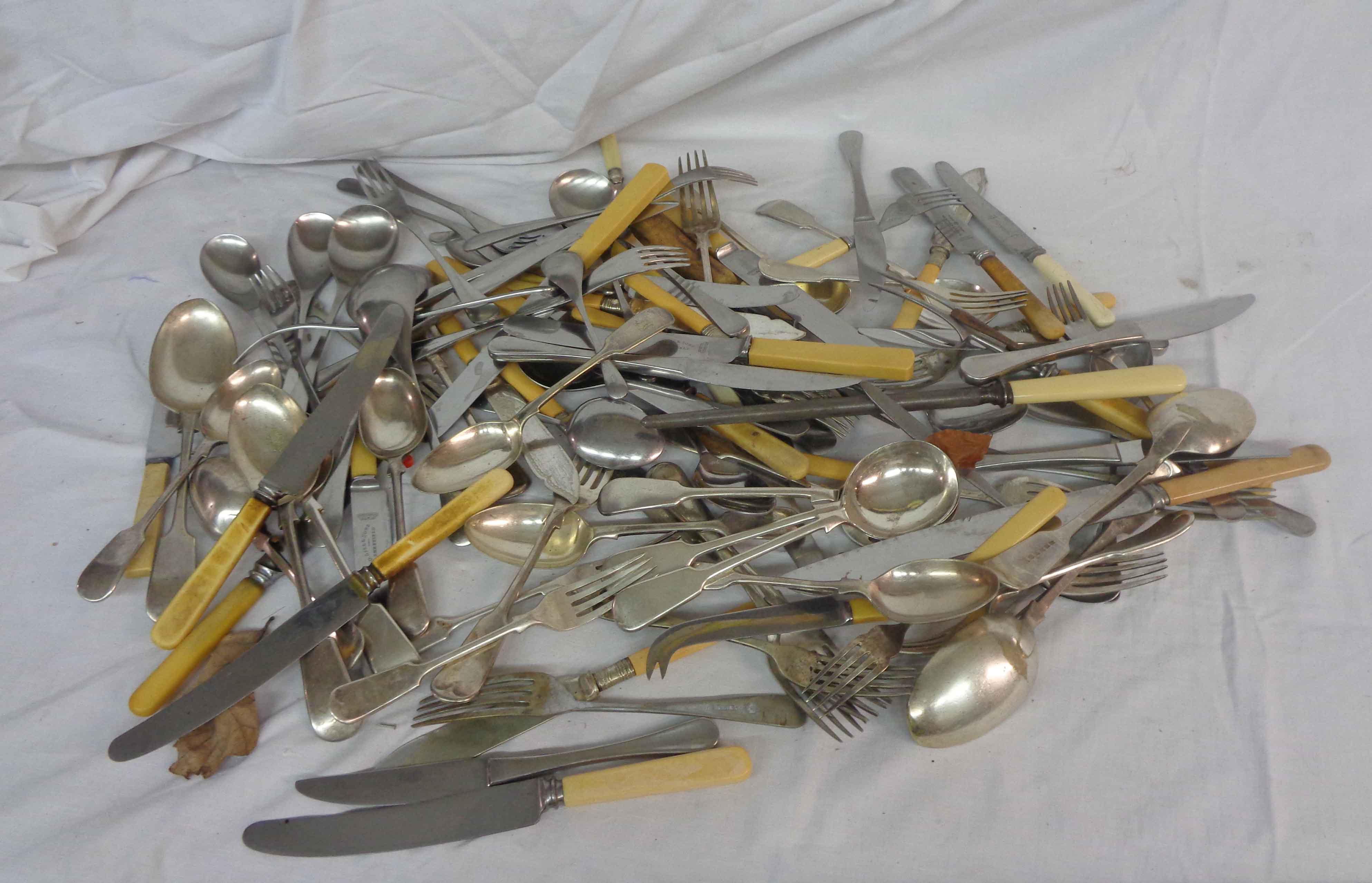 A box containing a quantity of assorted silver plated cutlery