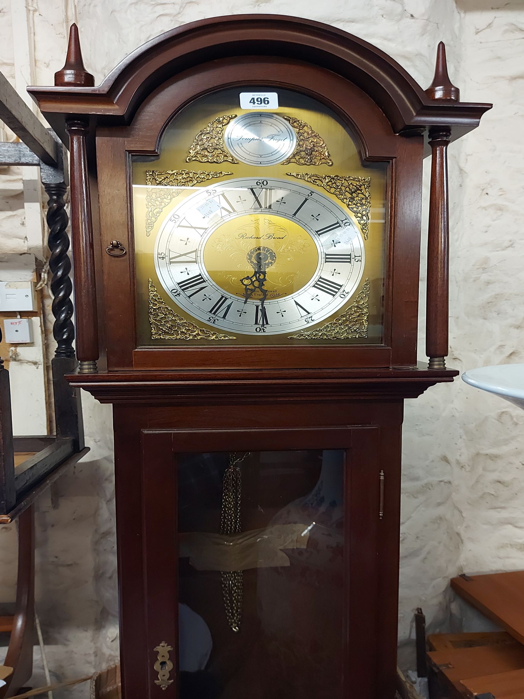 A 20th Century mahogany longcase clock, the 27cm arched dial marked for retailer Richard Broad of