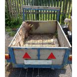 A box trailer with wooden sides