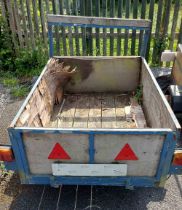 A box trailer with wooden sides