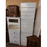A modern white painted wood bedroom suite comprising 64cm chest of three drawers with stained