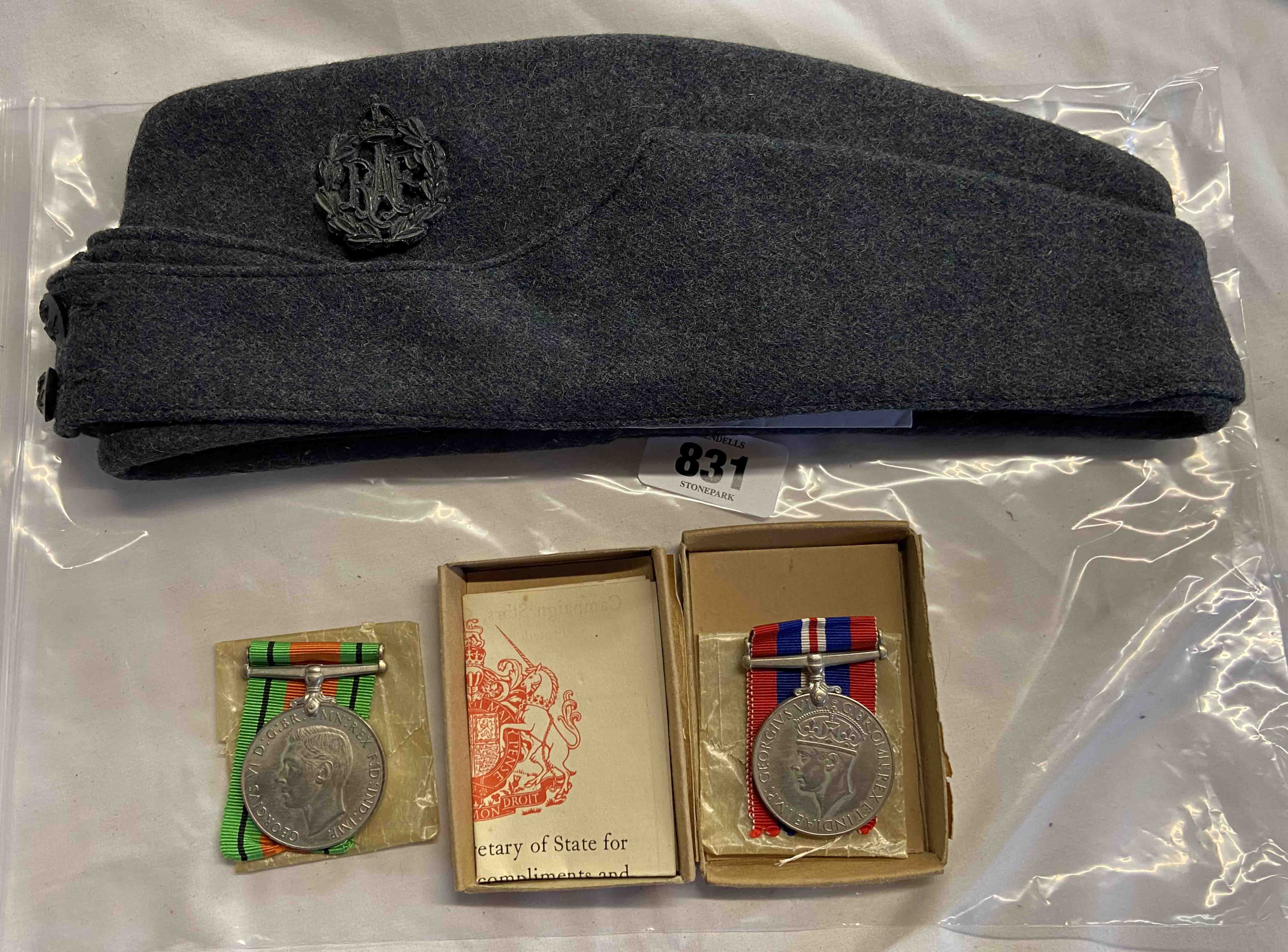 An RAF beret with loose 'Dental Branch' badge - sold with a boxed pair of Second World War medals