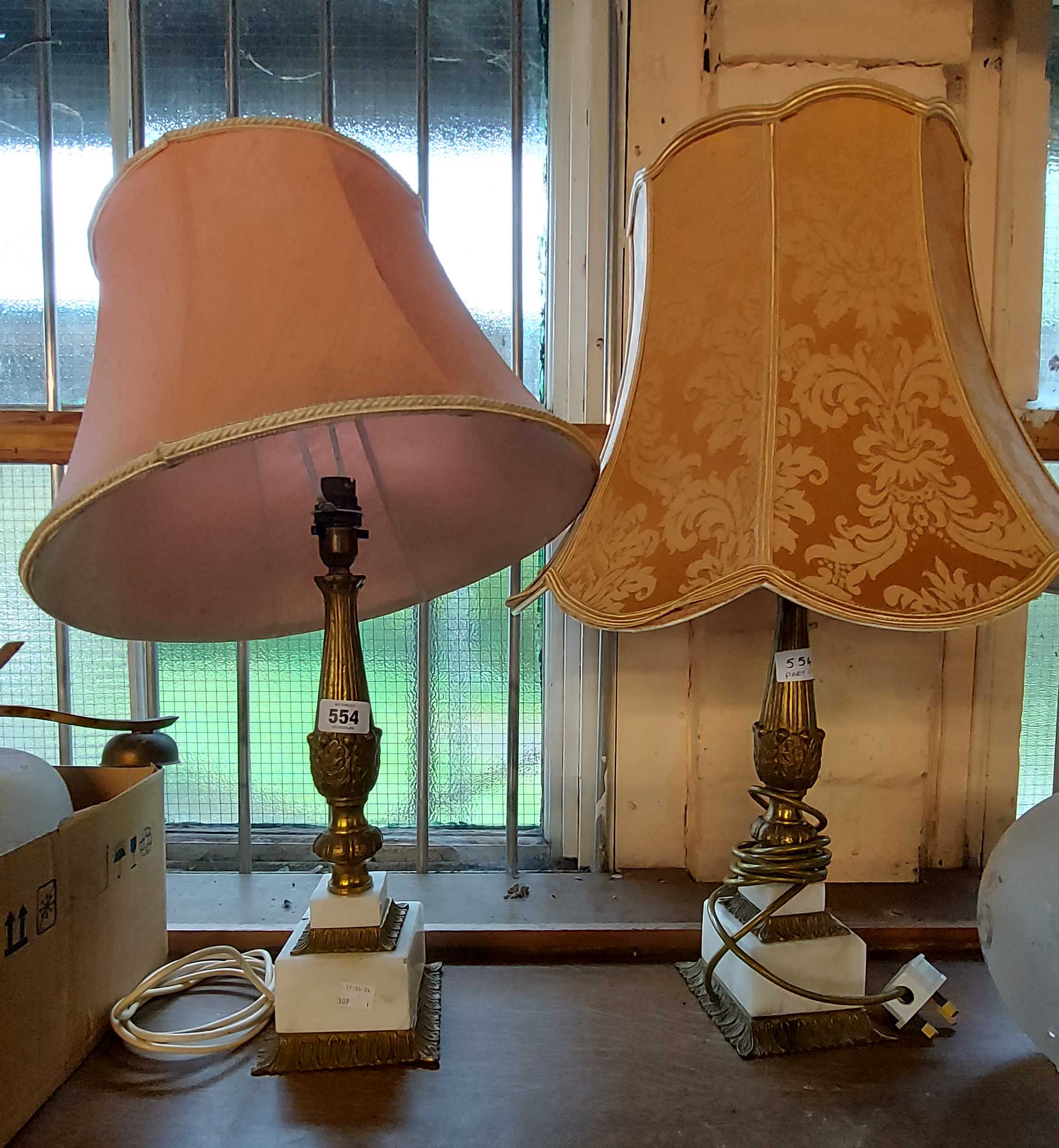 A pair of vintage marble and brass tables