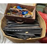 A box containing a large quantity of Scalextric track and accessories - sold with a box of Meccano