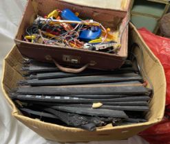 A box containing a large quantity of Scalextric track and accessories - sold with a box of Meccano