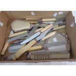 A vintage silver plated three piece dressing table hand mirror and brush set - sold with a