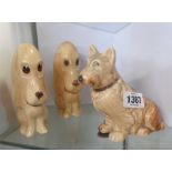 Two SylvaC pottery 'long faced' dog figurines - sold with another similar