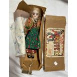 A Marco Puppets box containing a porcelain headed doll in the style of an Eastern European girl