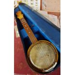 A vintage banjo set in fitted hard carry case