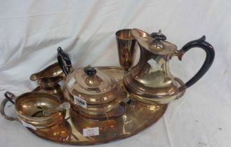 A silver pated four piece tea set, on oval tea tray - sold with a plated goblet
