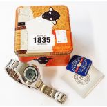 A Fossil wristwatch, a gold watch, etc. A 2001 Fossil 'Big Tic' JR-7947 unisex steel cased