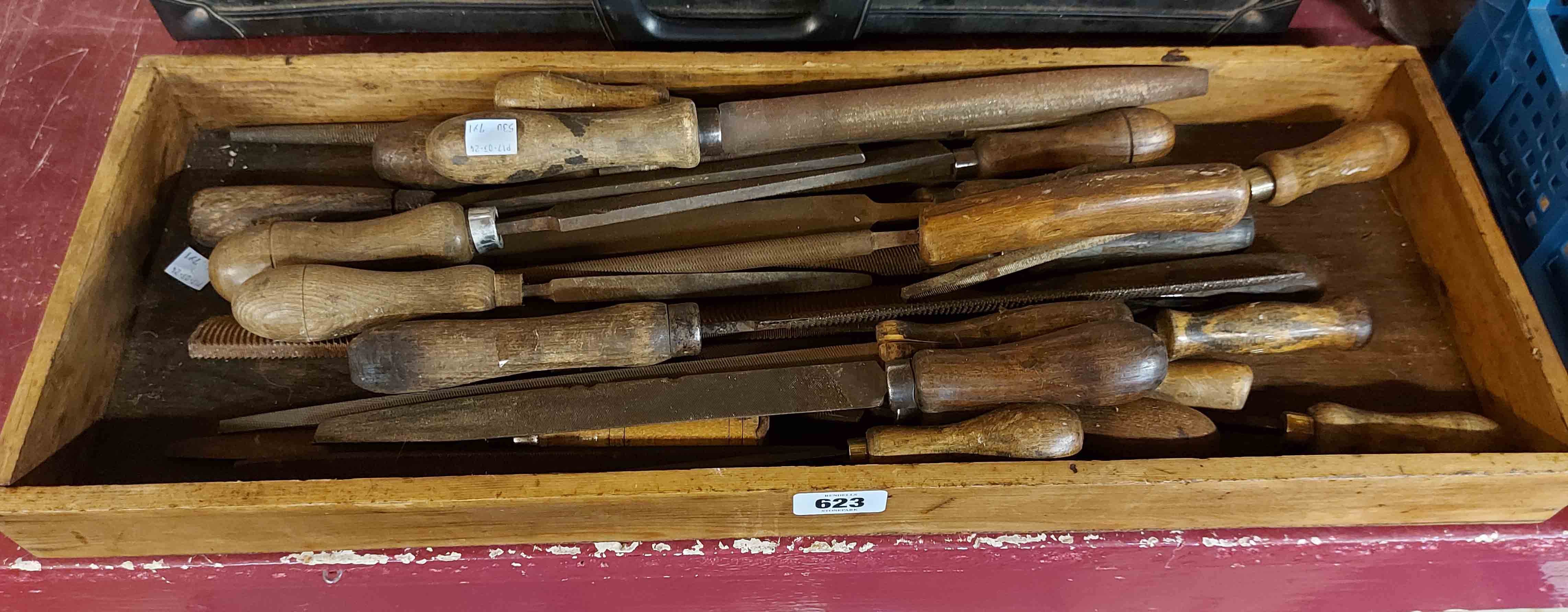 An assortment of engineering files in wooden tray