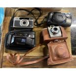 A small box of six vintage cameras including a cased Kodak Bantom, etc.