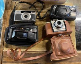 A small box of six vintage cameras including a cased Kodak Bantom, etc.