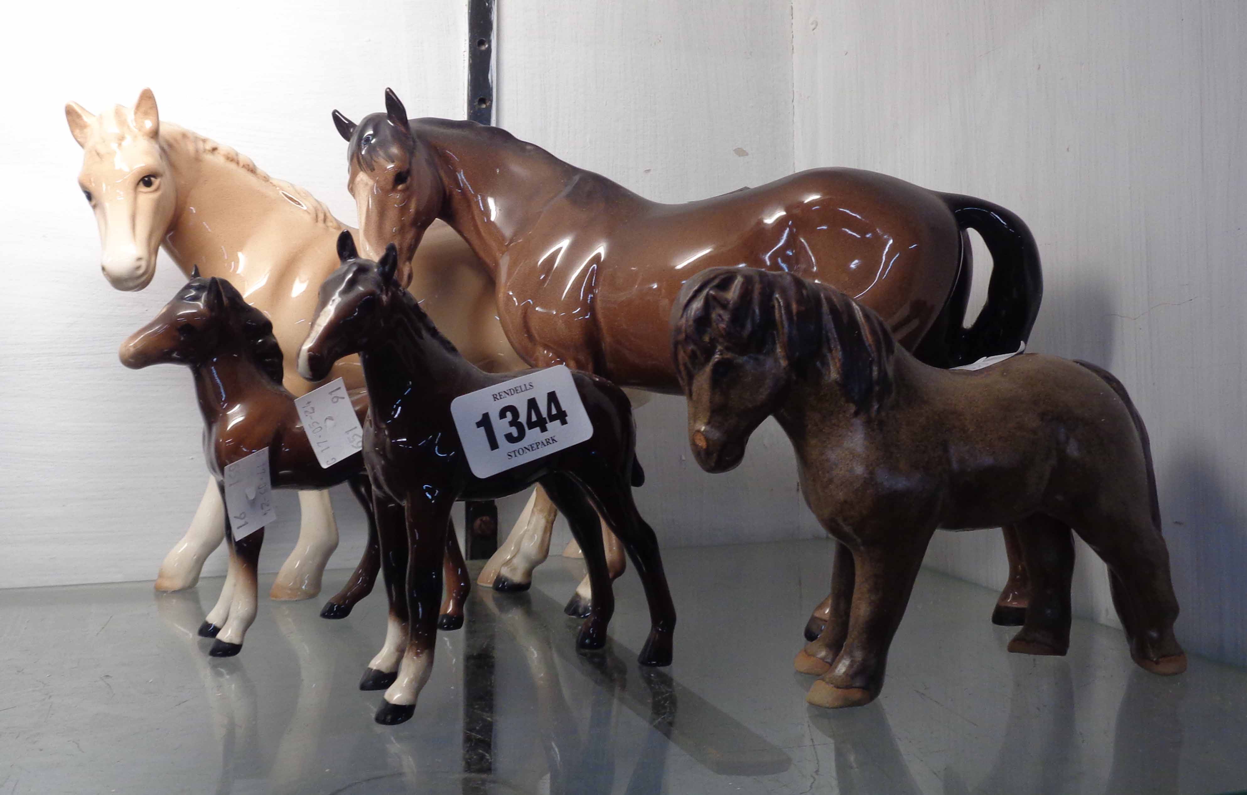 Five ceramic horse figurines including Beswick, etc.