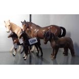 Five ceramic horse figurines including Beswick, etc.