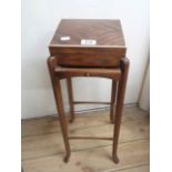 A vintage mahogany and strung gentleman's grooming table with mirror to underside of lift-top and