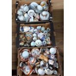 Three boxes containing a quantity of Japanese eggshell porcelain tea sets, etc.