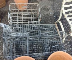 A vintage metal milk crate - sold with three metal storage baskets