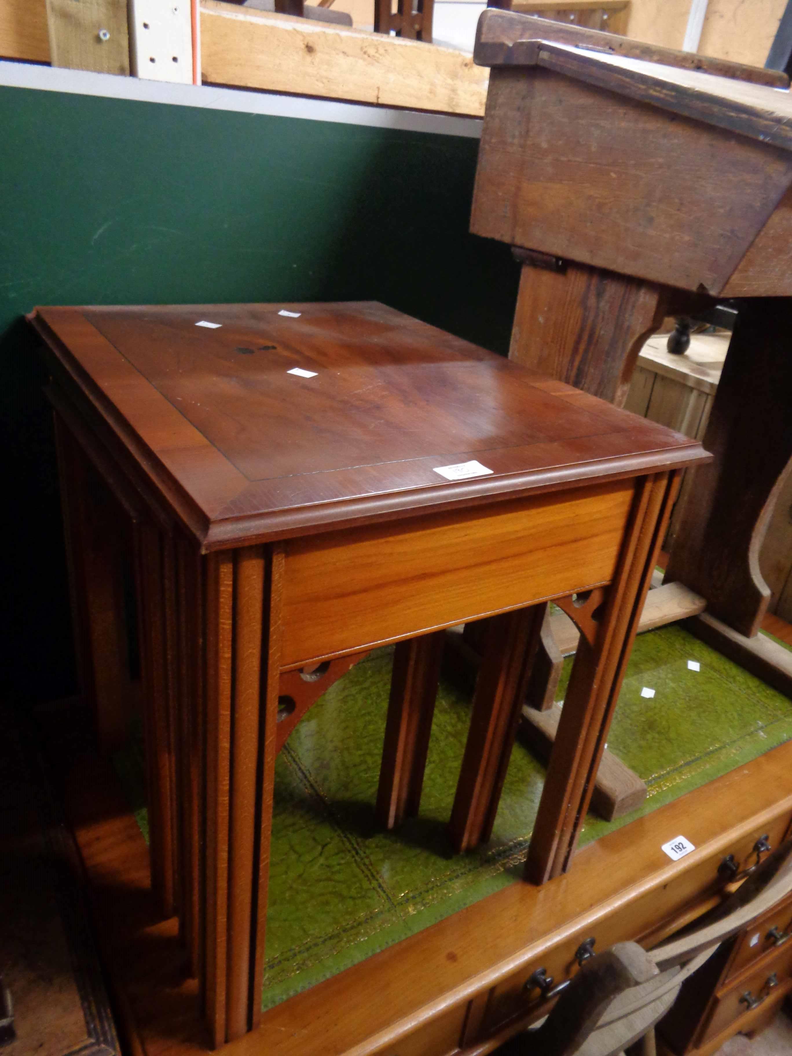 A 20th Century oak three drawer bedside chest - sold with a reproduction nest of three tea tables - Image 2 of 2