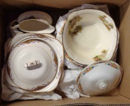 A box containing a quantity of assorted pottery tableware including tureens, etc.