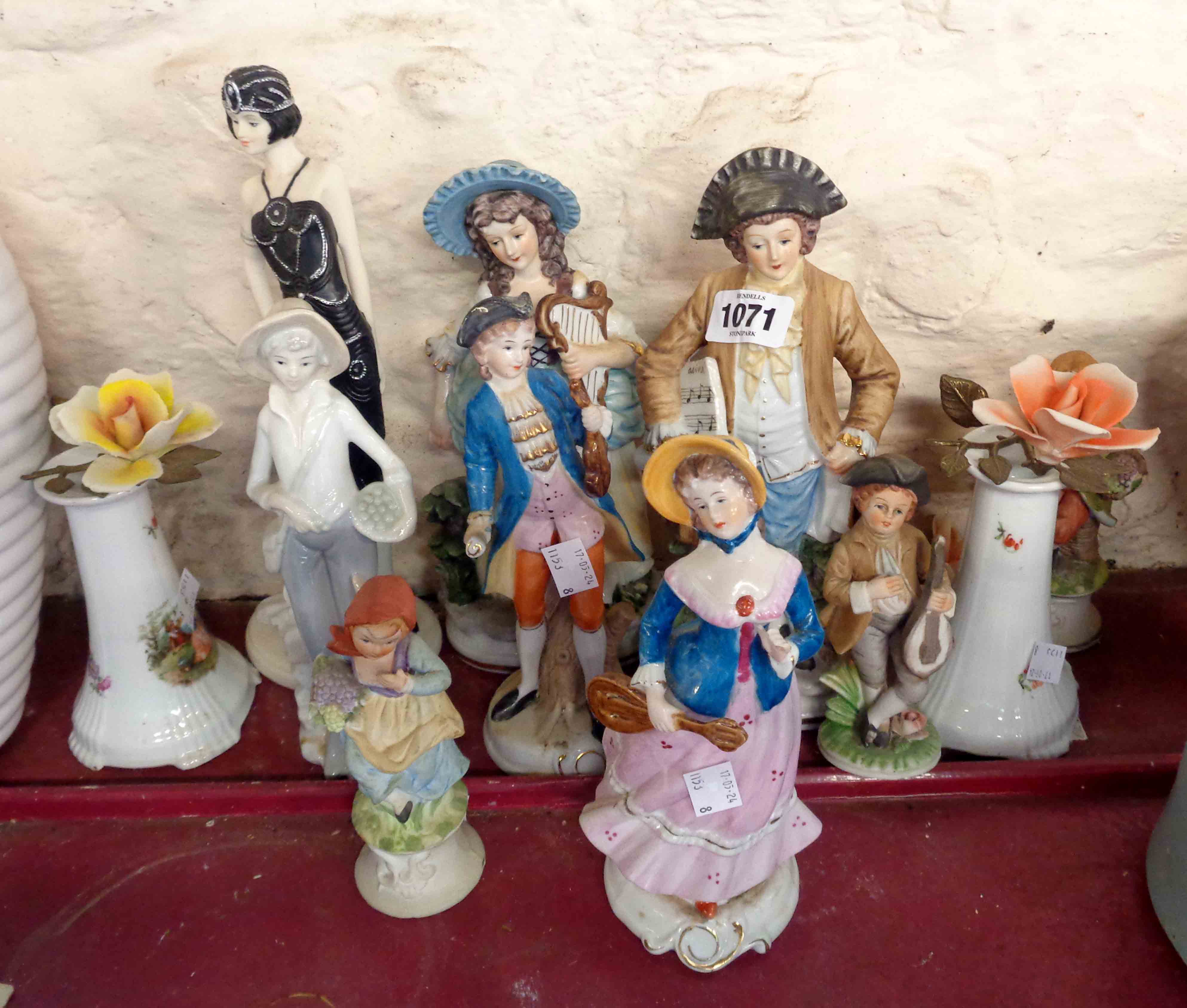 A quantity of continental porcelain and other figurines, etc.