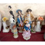 A quantity of continental porcelain and other figurines, etc.