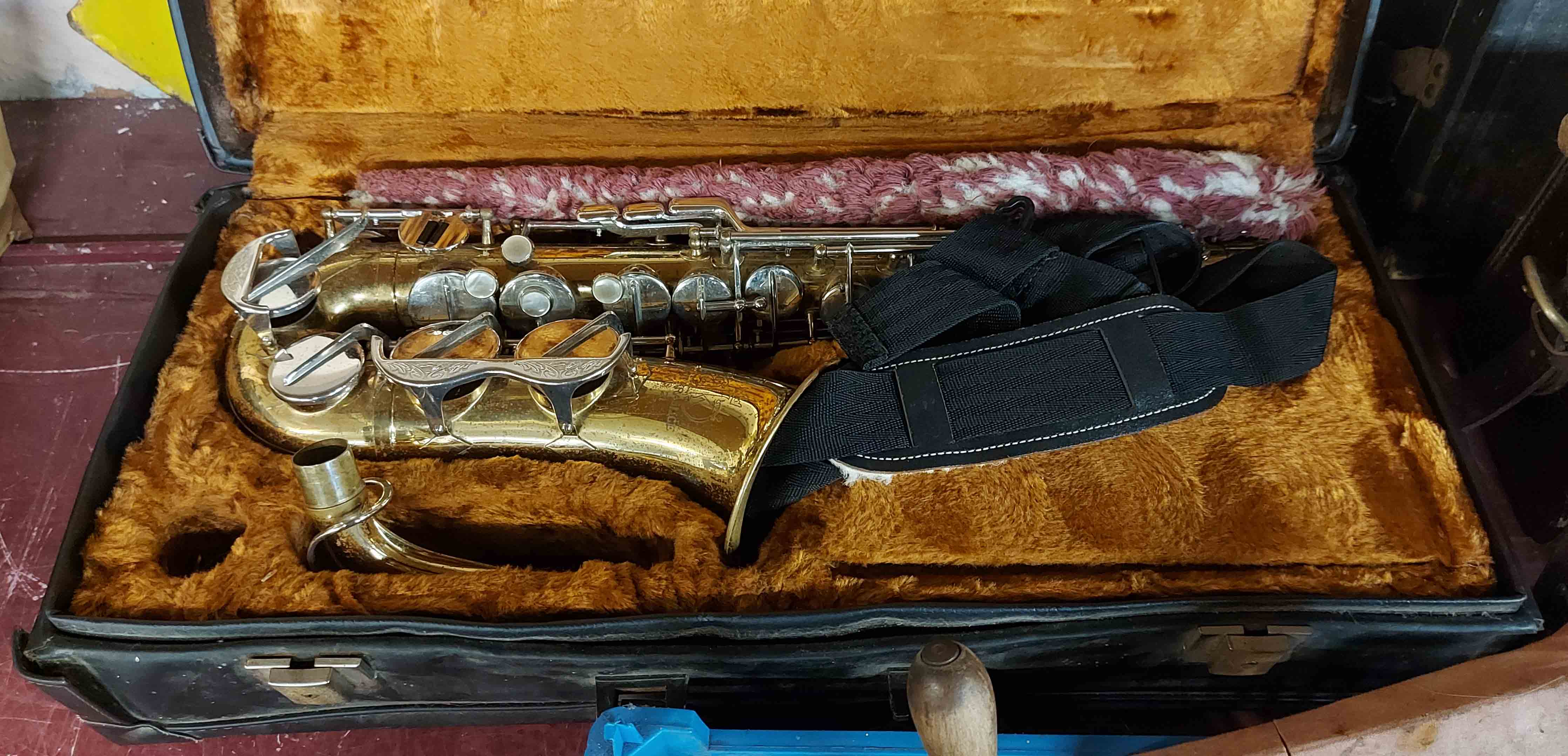 A cased Amati Kraslice ASS21 Alto saxophone