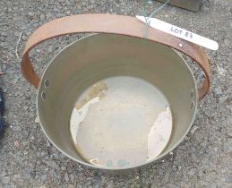 A brass cooking pot
