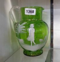 A 19th Century green glass vase with Mary Gregory style decoration, depicting a young girl