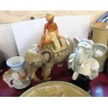 A vintage plaster figurine, depicting an elephant and rider - sold with a ceramic elephant form