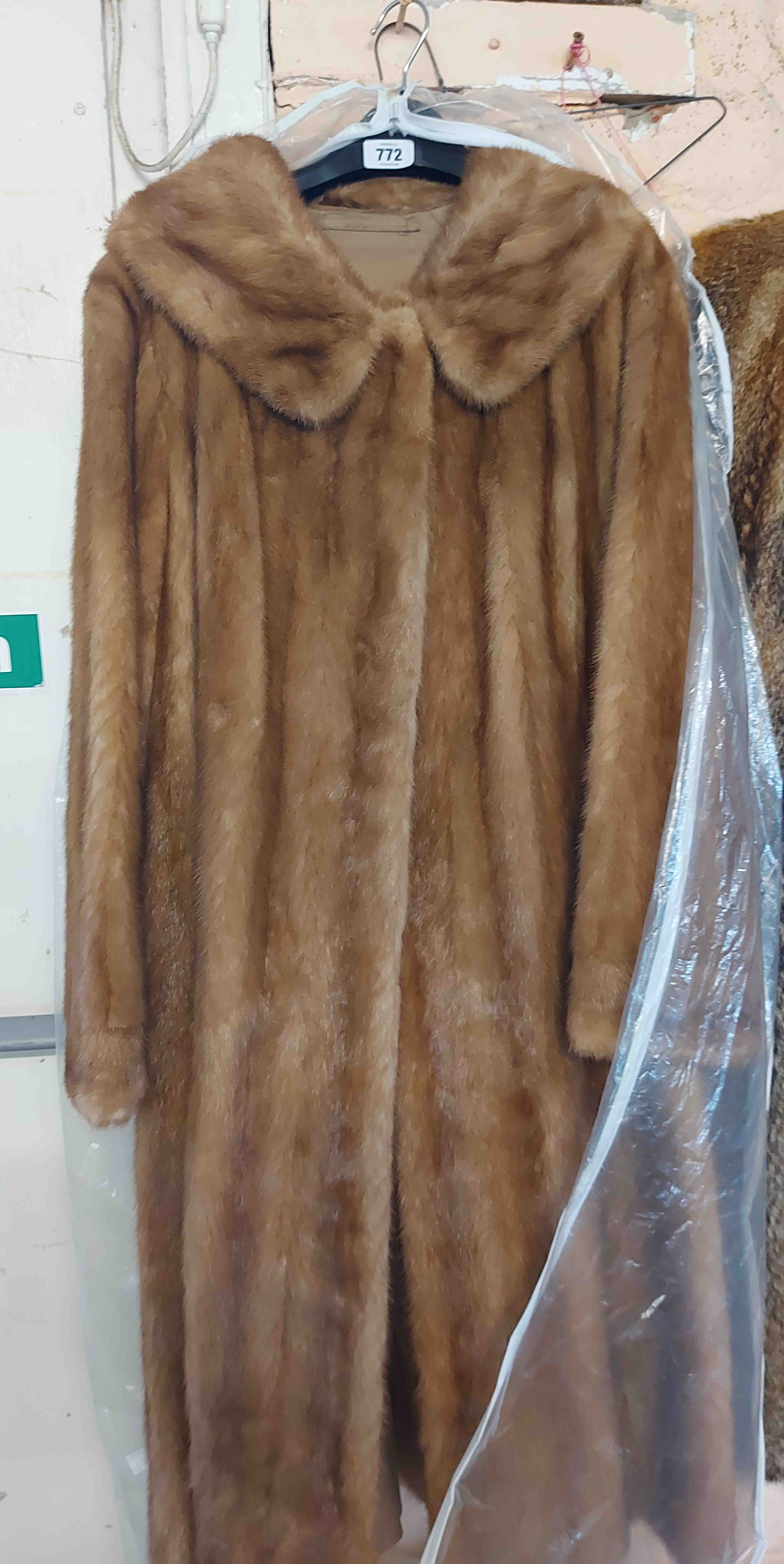 An old fur coat and hat