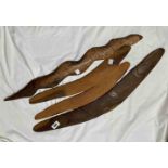 Three old Aboriginal Australian wooden hunting boomerangs and a fighting stick in the form of a