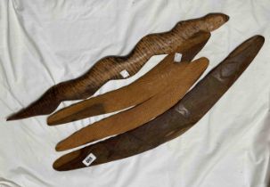 Three old Aboriginal Australian wooden hunting boomerangs and a fighting stick in the form of a