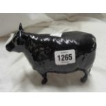 A Beswick Angus cow figurine, model No.1563 with black glaze finish and gold 'Angus Society'
