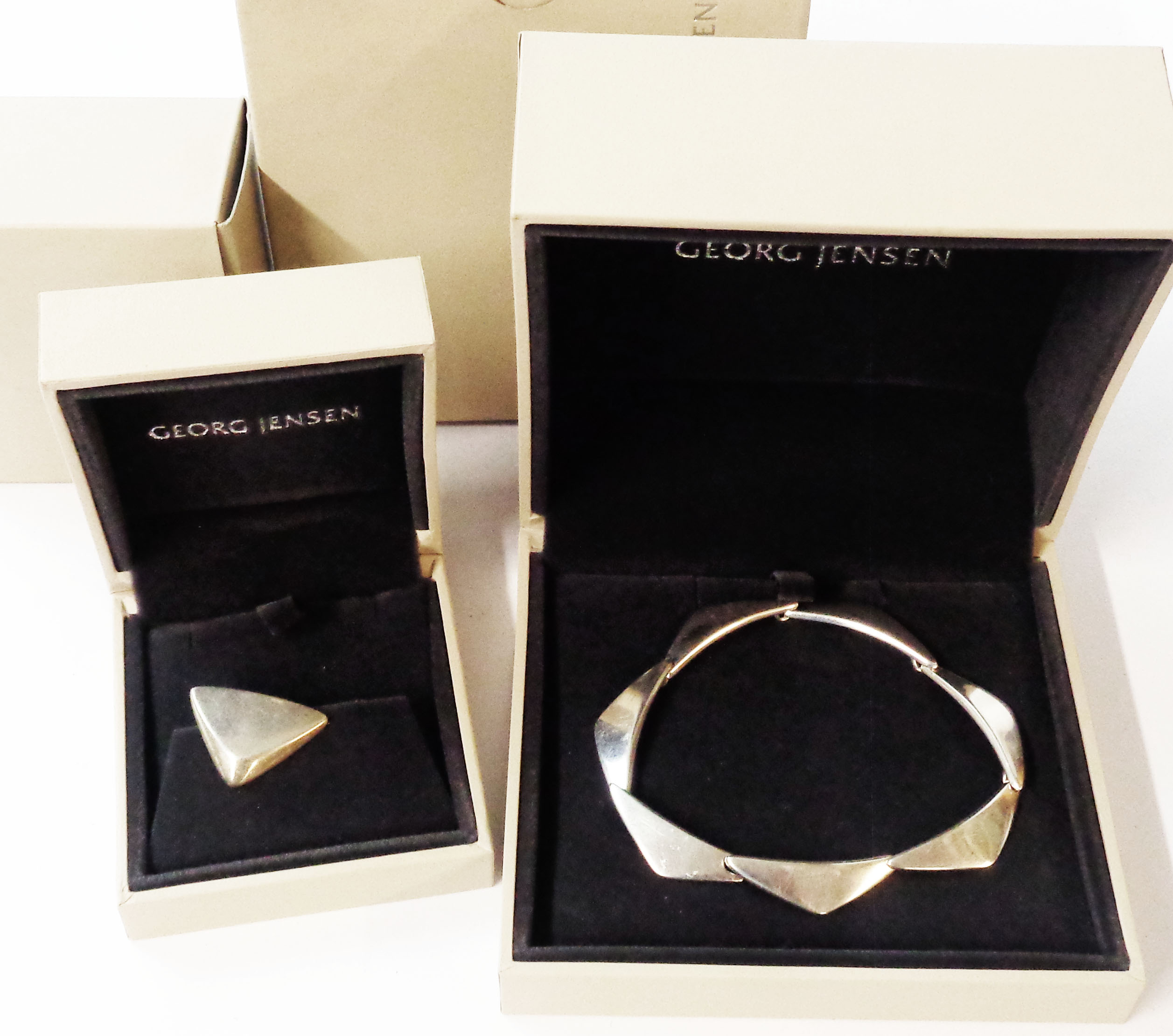 A modern Georg Jensen 925 sterling silver 'boomerang' panel-link bracelet - sold with a matching