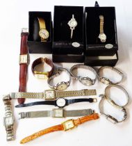 A bag containing a selection of assorted modern ladies' and gentlemen's wristwatches including