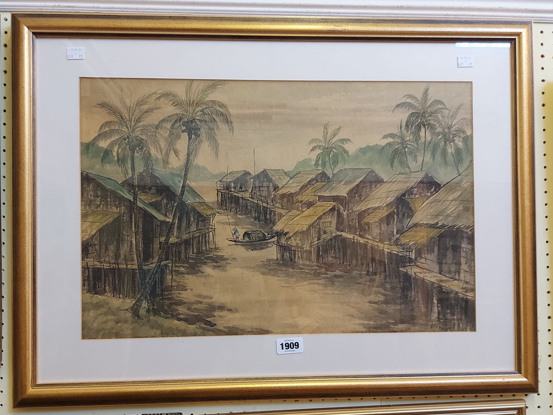 Minh: a gilt framed watercolour, depicting a view of Balinese buildings and river - signed