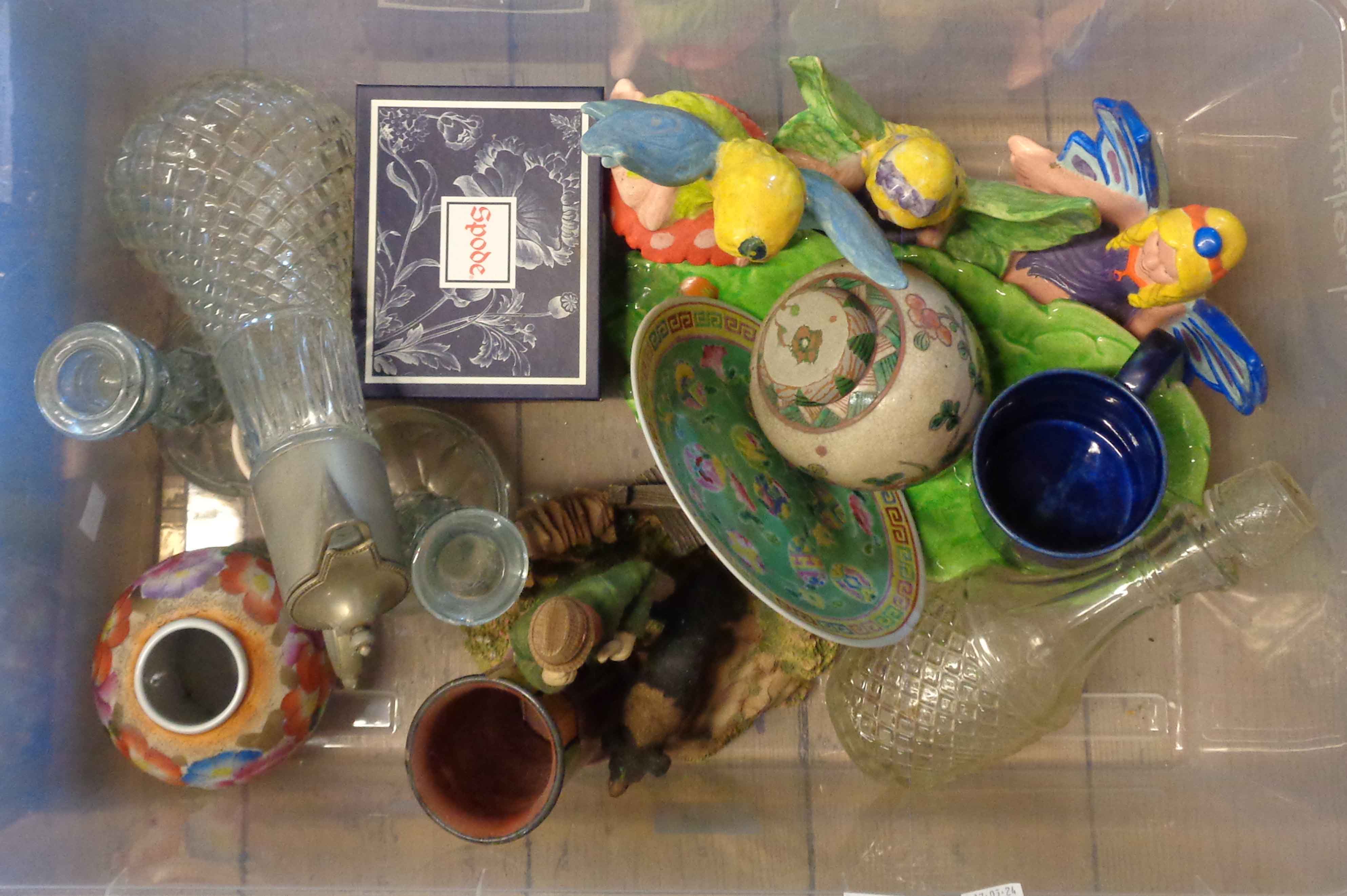 A crate containing a quantity of ceramic and glass items