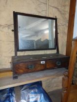 A Victorian mahogany platform dressing table mirror with oblong plate and two drawers to base