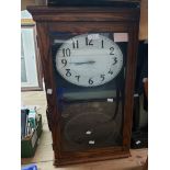 An early 20th Century oak cased and glazed International Time Recording Co., Ltd. master wall