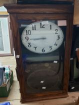 An early 20th Century oak cased and glazed International Time Recording Co., Ltd. master wall