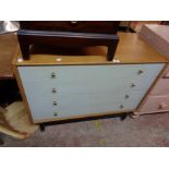 A 96cm retro G-Plan part painted chest of four long drawers, set on tapered legs with brass feet -