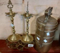 A brass tiffin box, tealight holder, brass stands and brass trivet