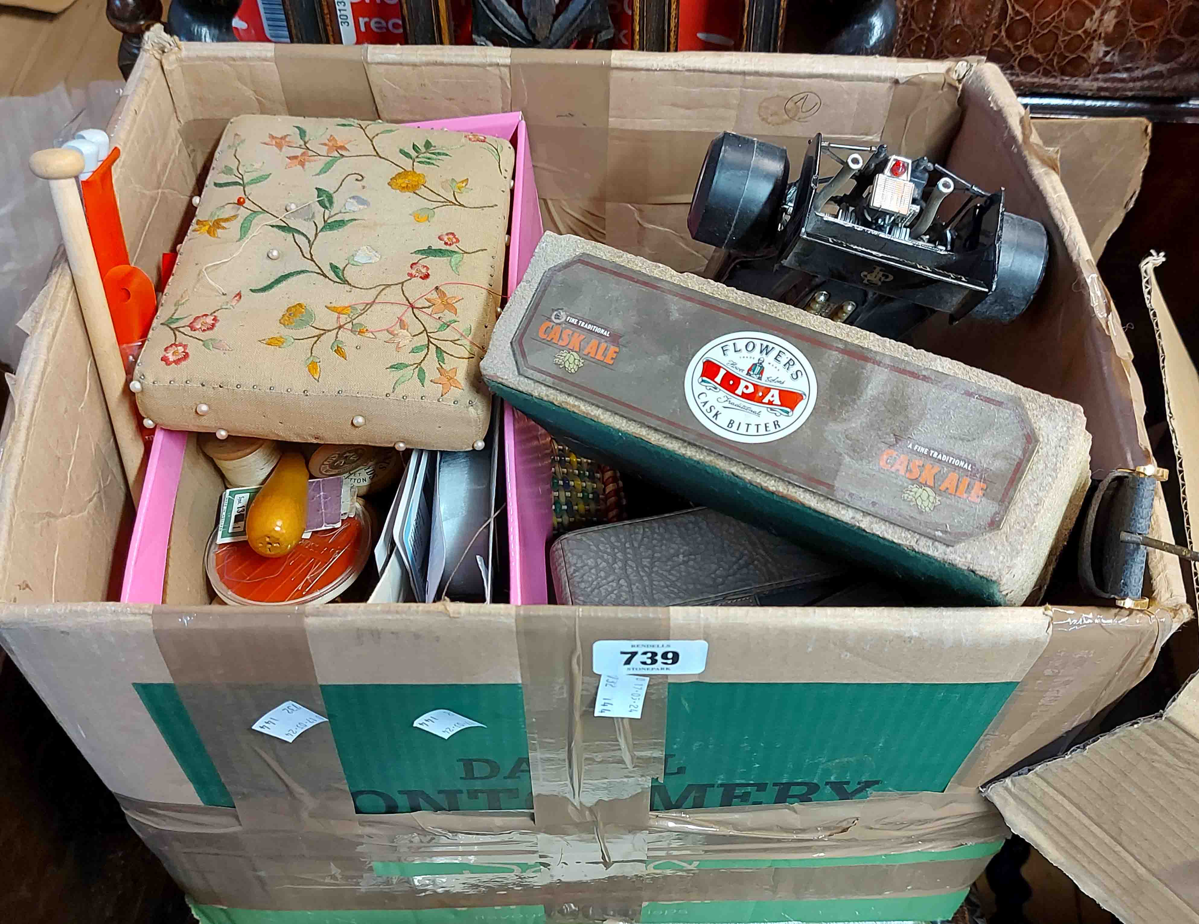 A box containing miscellaneous collectable items including sewing box and contents, two toy cars,