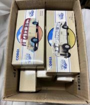 A box containing seven boxed Corgi Classic buses