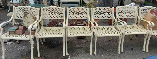 A set of six painted metal garden chairs