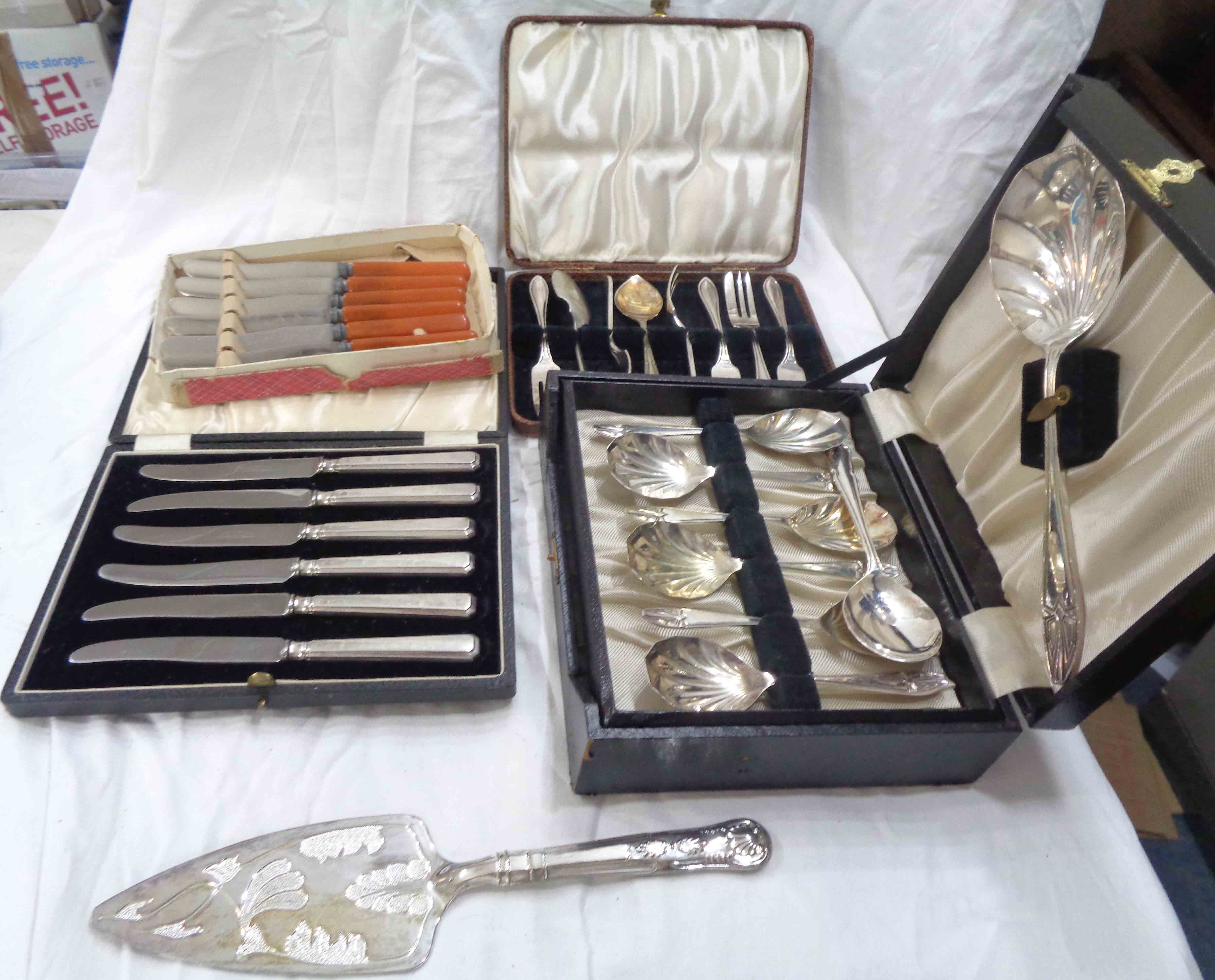 A cased set of six silver handled tea knives - sold with other cased and boxed silver plated