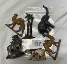 A bag containing a quantity of early 20th Century die cast zoo animals